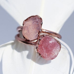 Raw Madagascar rose quartz stone set on a copper ring band with an organic style setting.