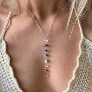 Our 7 chakra necklace features a gemstone rainbow strand- one stone for each of the 7 chakras. A perfect gift for her or yourself, this healing necklace includes pink tourmaline, carnelian, citrine, peridot, turquoise, lapis lazuli and amethyst.