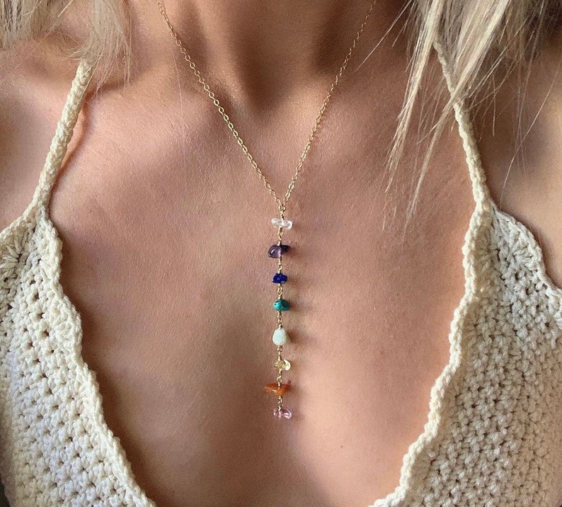 Our 7 chakra necklace features a gemstone rainbow strand- one stone for each of the 7 chakras. A perfect gift for her or yourself, this healing necklace includes pink tourmaline, carnelian, citrine, peridot, turquoise, lapis lazuli and amethyst.