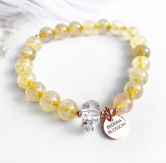 Gold Rutilated Clear Quartz Stretchy Bracelets Gold Rutilated Clear Quartz Stretchy Bracelets