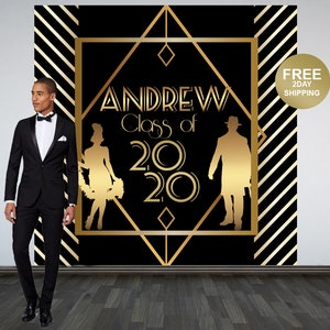 May include: Gold and black graduation backdrop with the text "ANDREW Class of 2020" in a geometric design. The backdrop features silhouettes of a man and woman in 1920s attire.