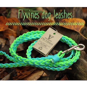 May include: A green and blue braided dog leash with a silver clasp. The leash is made from 100% recycled fly line and is labeled "Flyvines 100% Recycled Fly Line Accessories Made in Montana".