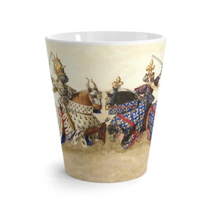 May include: A white latte mug featuring a historical illustration of two knights jousting on horseback. The knights are clad in ornate armor and colorful heraldic garments. The background is a parchment-like color.