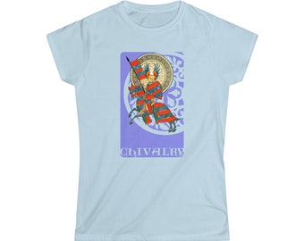 May include: Light blue t-shirt featuring a medieval knight illustration. The knight, clad in red and blue armor, rides a horse and holds a flag. The word "CHIVALRY" is printed in a stylized font below the image.