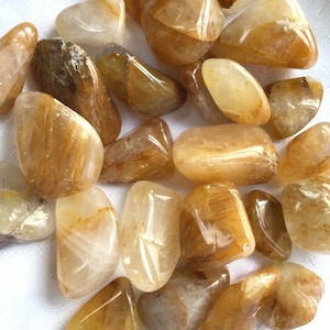 Golden Healer Quartz Tumbled Stones: Hematoid Crystal for Meditation