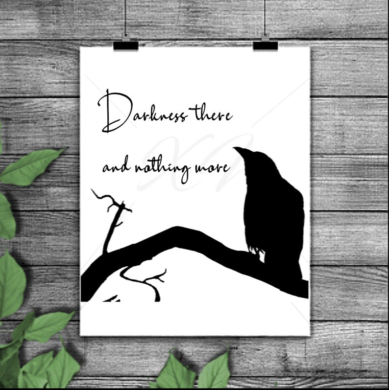 May include: A white print featuring a black silhouette of a raven perched on a branch, with the quote "Darkness there and nothing more" in elegant script. The artwork is mounted on a wooden background.