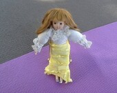 Russ Porcelain Cloth Doll in High Heels. Long Blonde Hair. White Blouse. Yellow Skirt. 7 3 4th in. Dollhouse Ready. Rare Doll by Russ.