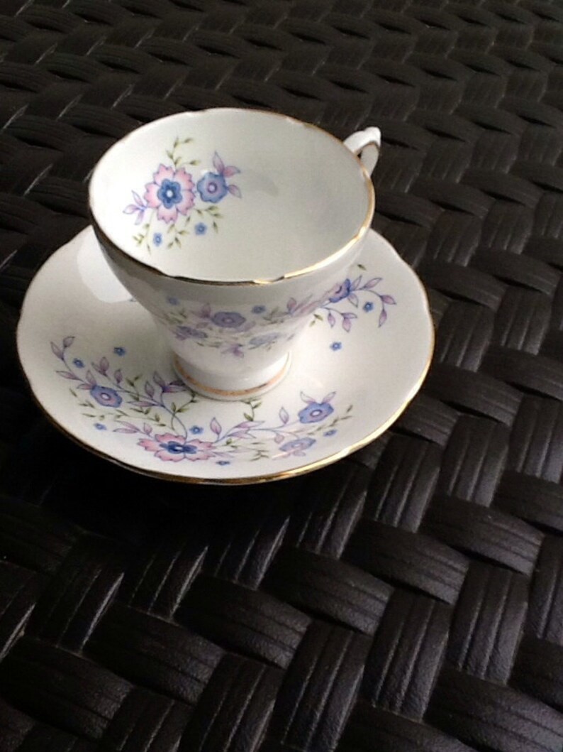 Avon Bone China flutededge Cup/Saucer. Florals in Blues on Etsy