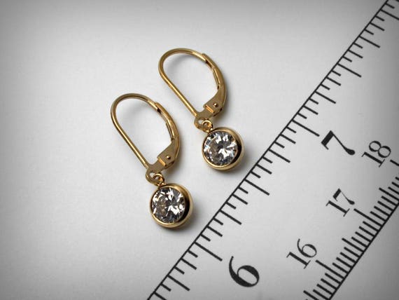 ORECCHINI PENDENTI IN ORO BIANCO 18 KT CON ZIRCONI E AMETISTA - Foto 10