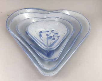 Four Nesting White Heart Plates with Hand Painted  Decoration