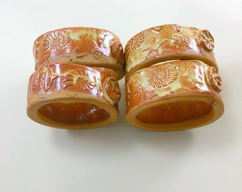 Set of Two Napkin Rings,  Textured Stoneware with a Cream Breaking Rust Glaze
