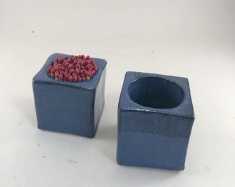 Match Striker/holder in your choice of Intense Blue, Nutmeg Brown, or Charcoal Satin