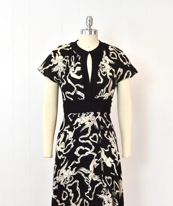 diane von furstenberg black dress DVF Shirt buttons lining the bodice Diane Von Furstenberg Claudia Slip