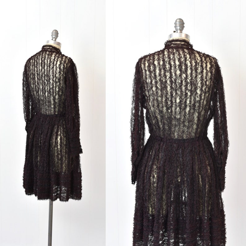 May include: A brown sheer lace dress with long sleeves and a ruffled skirt.