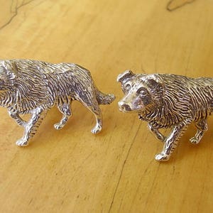 Gemelos grandes de plata de ley con forma de perro pastor Border Collie