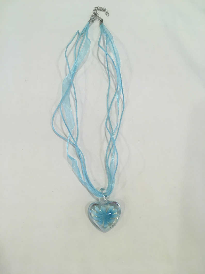 Glass Blue Heart Pendant With Blooming Light Blue Flower