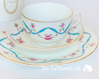 Antique Crown Staffordshire Bone China Tea Trio: Blue Ribbons, Pink Roses