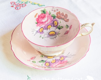Vintage soft pink Paragon cabinet teacup and saucer, pink gilding