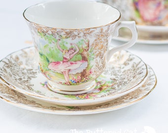 A vintage English bone china tea trio featuring a sweet ballerina / ballet dancer / dancing belle