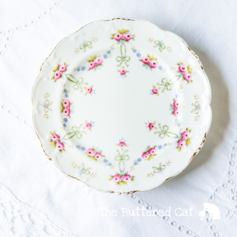 Collectible antique English china tea plate hand-decorated plate bows and rose swags