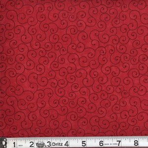 May include: Red fabric with a repeating pattern of black swirls.