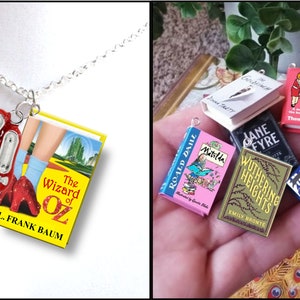 May include: A silver chain necklace with a charm featuring red ruby slippers and a miniature book cover from "The Wizard of Oz." Additional charms include miniature book covers from various literary classics.