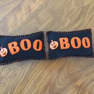 Boo mini pillow shelf sitter.