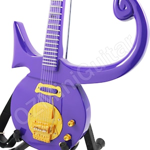 Miniatyrgitarr Prins Lila Symbol