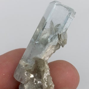 Double Terminated Aquamarine with Mica.