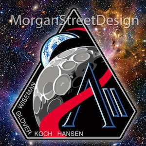 May include: A black and white patch with a space theme. The patch features a stylized moon, Earth, and a large letter "A". The names Wiseman, Glover, Koch, and Hansen are printed on the patch. The background is a colorful depiction of space with the text "Morgan Street Design".