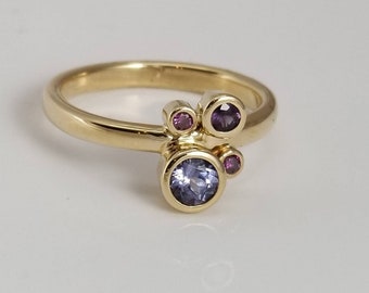 Galaxy ring with Lavender spinel, purple color shift garnet and purple diamonds