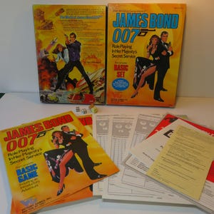 May include: A set of three ceramic mugs with a speckled, matte finish. Each mug features a different color: light blue, cream, and gray. The mugs have a simple, modern design and a comfortable handle.