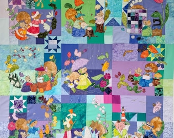 Full kit and pattern for The Adventures of Poppy and Flo  block of the month quilt