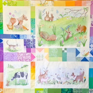 May include: A colorful patchwork quilt featuring watercolor illustrations of farm animals and bunnies. The quilt includes images of a horse, chickens, a cat, a cow, a pig, goats, geese, and a dog. The quilt has a rainbow border and various patterned squares.