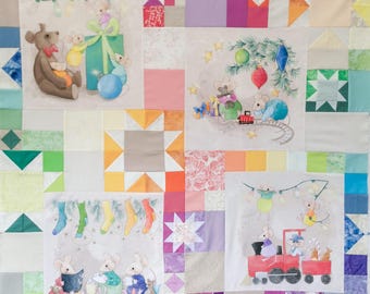 Printed pattern for  "rainbow patch" quilt using panels