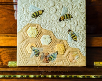 Printed pattern for  I2" panel with beehive  on tan cotton