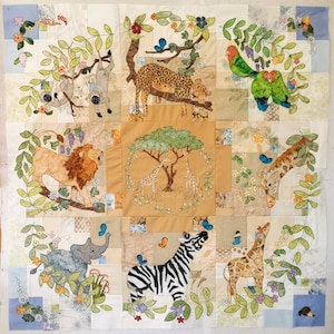 May include: A colourful patchwork quilt with an African safari theme. The quilt features embroidered images of animals such as a lion, giraffe, zebra, elephant, and leopard, along with trees, butterflies, and flowers.