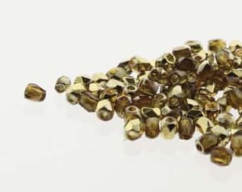 True 2 Czech 2mm Fire Polished  - Pack 100 - Topaz Amber