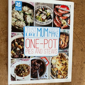 May include: A cookbook cover with the title "Just Like Mum Used To Make One-Pot Pies and Stews". The cover features a collage of photos of various stews and pies, including a chicken and asparagus stew, a seafood stew, a sausage stew, a beef stew, and a potato pie.