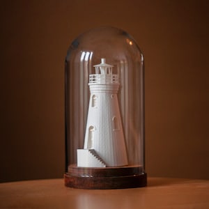 Paper Lighthouse Sculpture in Glass Dome: Coastal Architectural Art