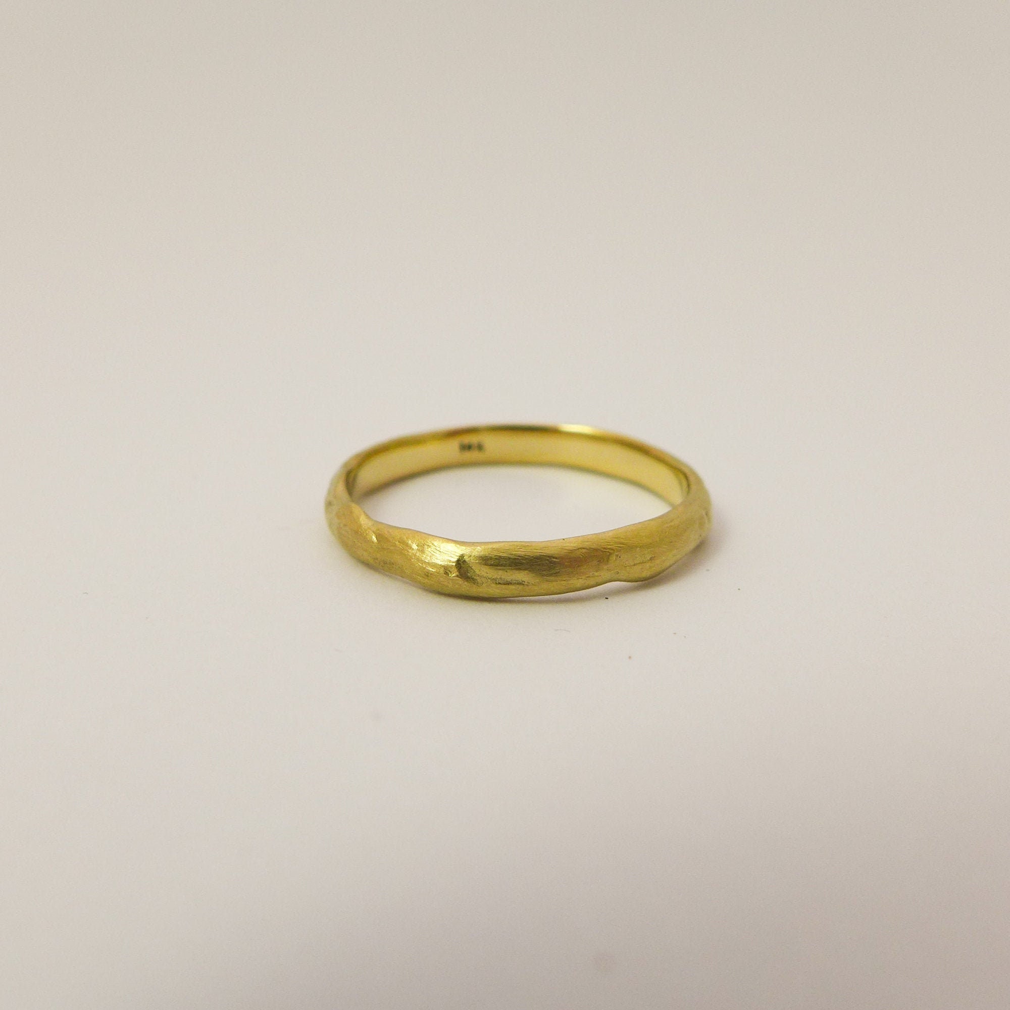 Raw gold wedding band deals