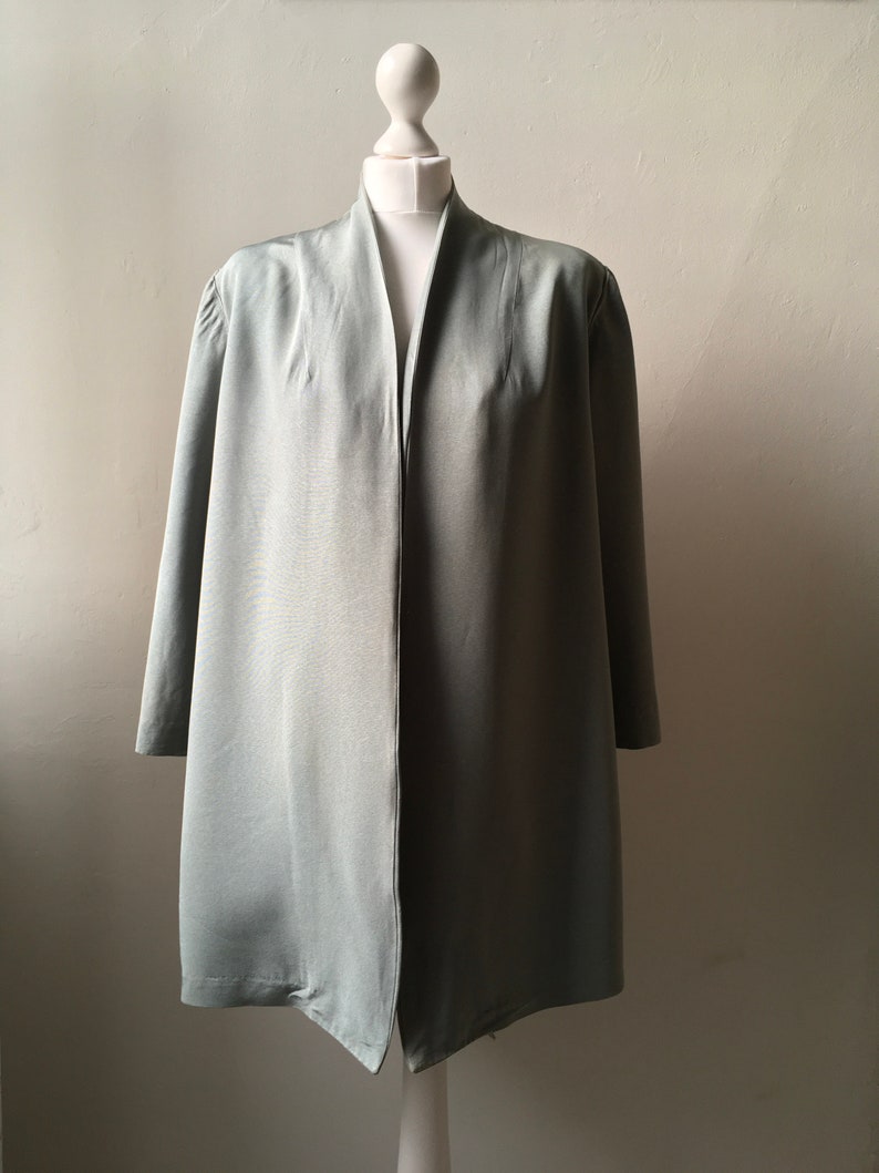 Vintage late 1940s early 1950s Wayne Smith cadet grey blue satin grosgrain edge to edge open fronted swing jacket short coat