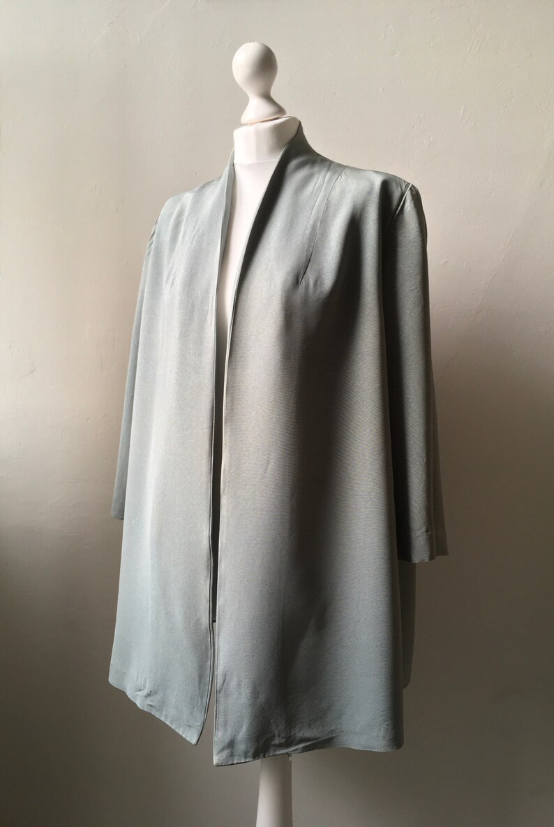 Vintage late 1940s early 1950s Wayne Smith cadet grey blue satin grosgrain edge to edge open fronted swing jacket short coat