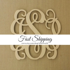 May include: Wooden monogram with the letters "S" and "G" intertwined. The letters are cut out of a single piece of wood and have a delicate, cursive style. The monogram is on a burlap background. The text "Fast Shipping" and a website address are visible below the monogram.