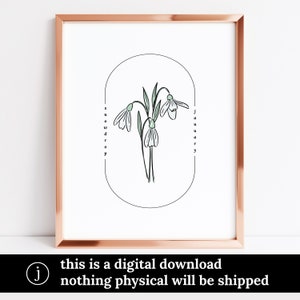May include: A framed art print featuring a botanical illustration of snowdrop flowers. The artwork is in a minimalist style with a copper-colored frame. Text on the print reads "snowdrop" and "january". The bottom of the print states "this is a digital download nothing physical will be shipped".