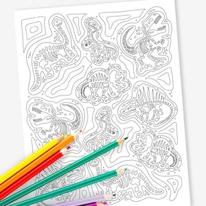 May include: A black and white dinosaur skeleton coloring page with various dinosaur species. Several colored pencils in yellow, orange, red, green, and purple are placed on the page, ready for use. The page is on a white background.