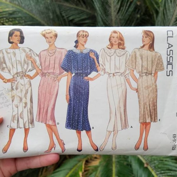 Straight pleated midi dress with jewel neckline, back zipper, elbow or long sleeves Butterick Classics pattern 5726 vintage 1980s chic