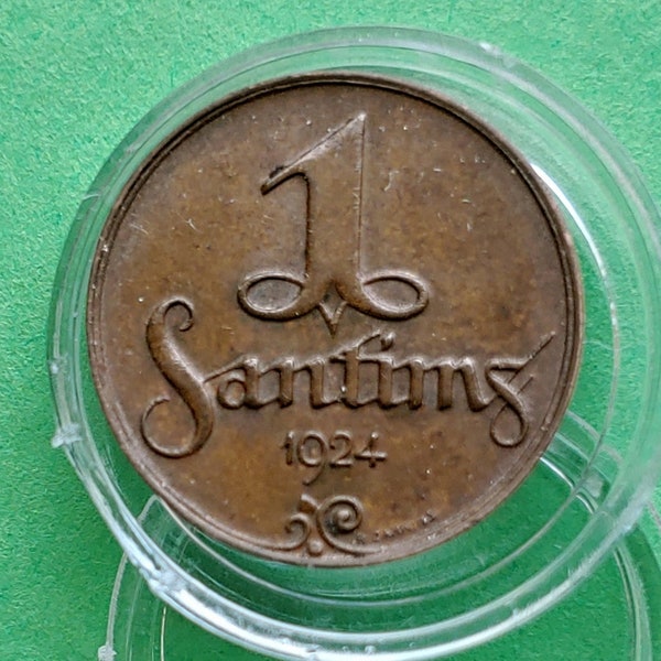 Rare Uncirculated 1924 Latvian Error Coin. Valuable die crack error type and a scarce Strike last minted Santim coin. New holder included