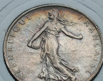 Brilliant uncirculated Gem 1918 France 2 Franc silver coin with new holder. Superb golden iridescent toning w COA & Box.