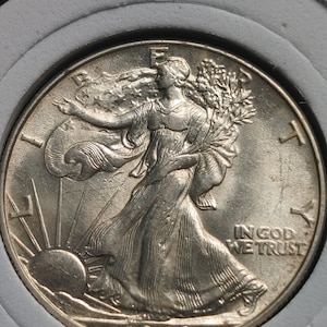 Brilliant Uncirculated 1946 Walking Liberty half dollar .900 silver with box, holder and COA